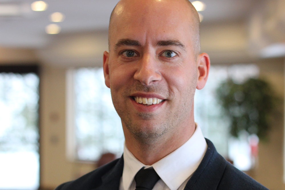 Dr. William den Hollander